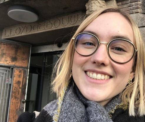smiling girl with glasses
